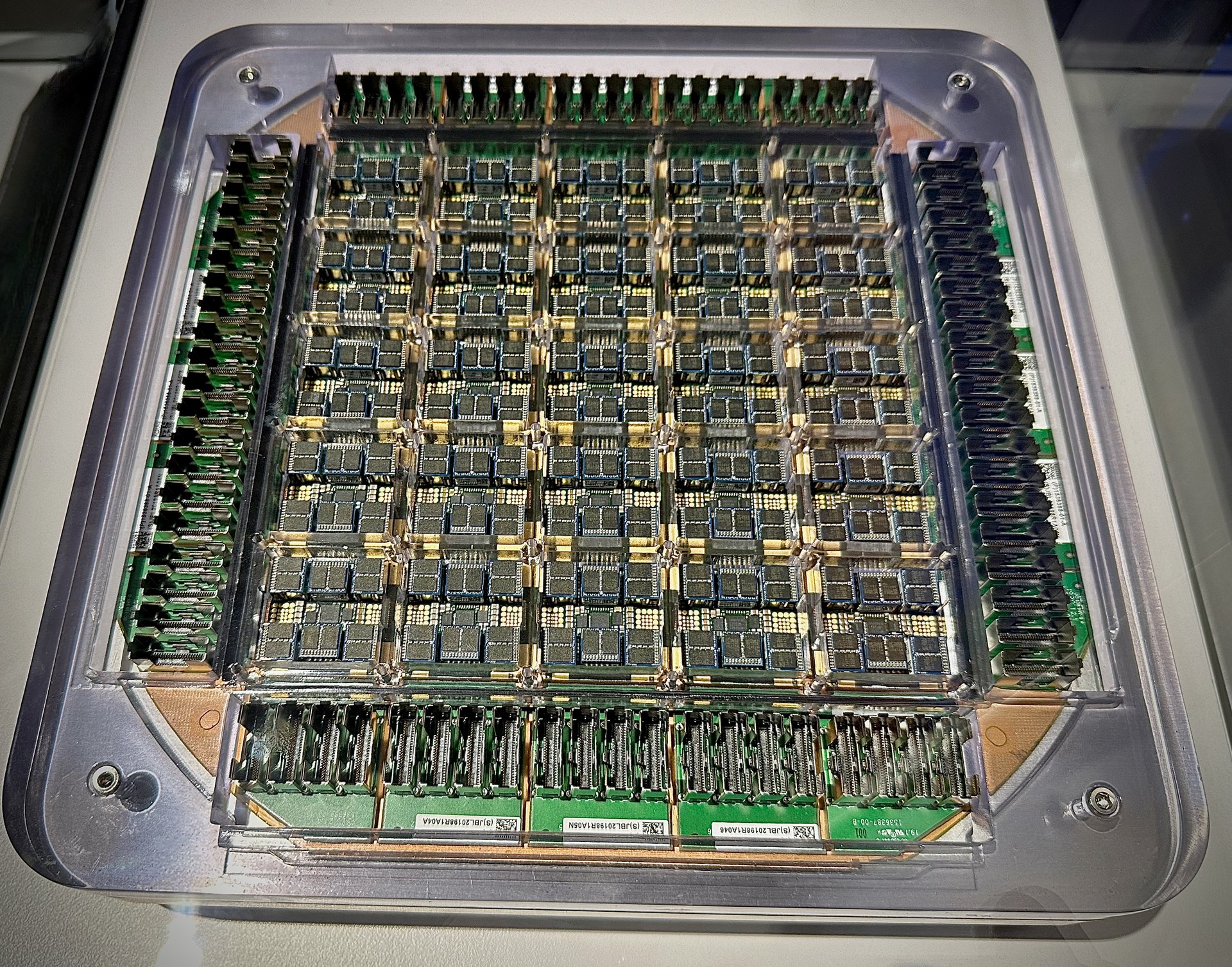 Dojo Training Tile assembly — power-delivery side; not a die micrograph.