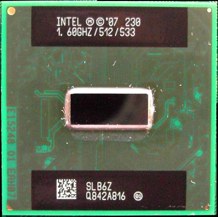 Intel Atom 230 package marked 1.60GHz/512/533 and SLB6Z. The exposed surface is visible; this is a package photograph, not a circuit micrograph.