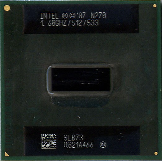 Intel Atom N270 package marked 1.60GHz/512/533 and SLB73. The exposed surface is visible; this is a package photograph, not a circuit micrograph.