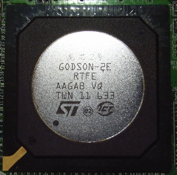 Godson-2E package marked GODSON-2E / RTFE with an ST logo, mounted on a board. Package exterior; no internal die is visible.